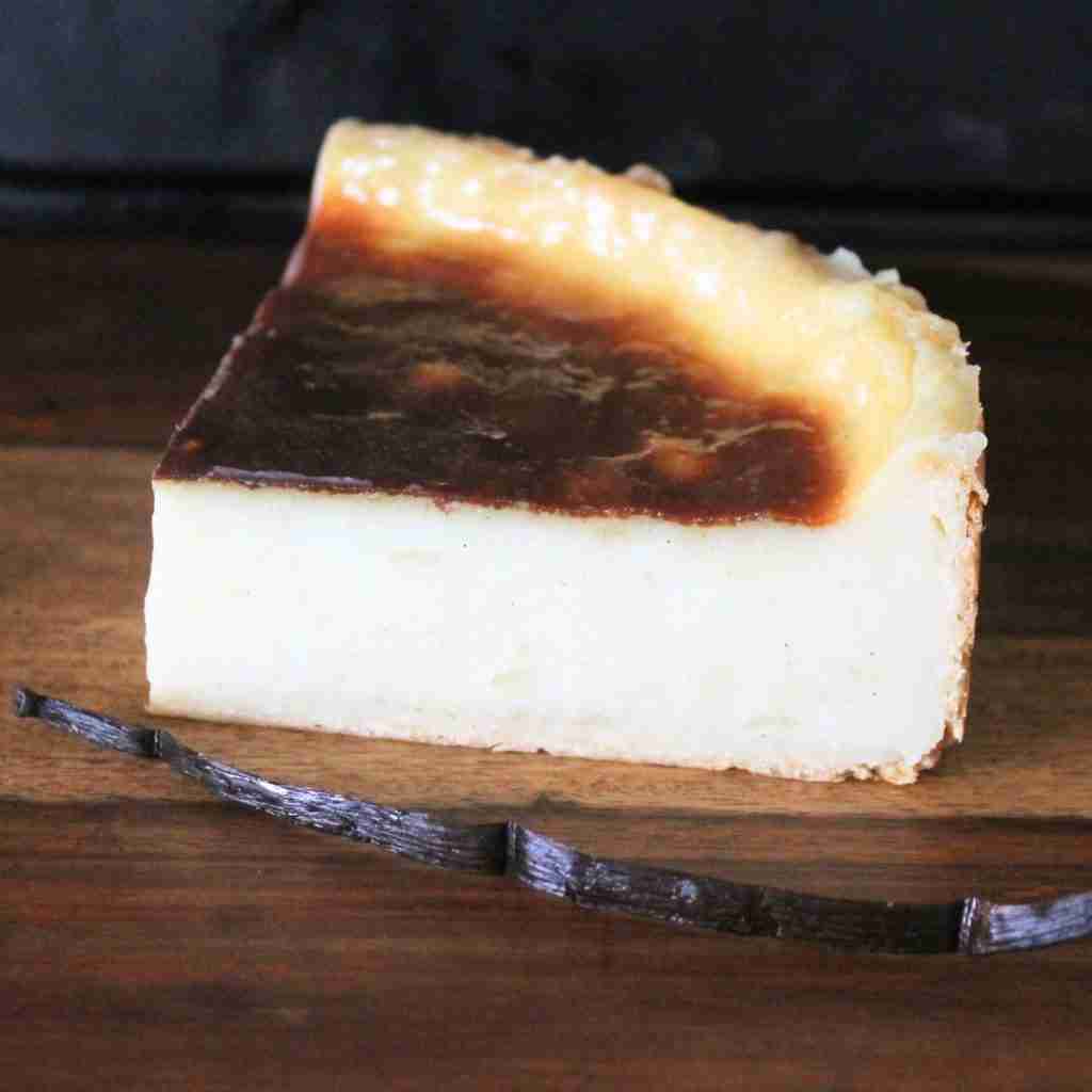 image of a flan patissier with a vanilla pod, you can learn how to make this custard French tart at cookery school gourmandises academie