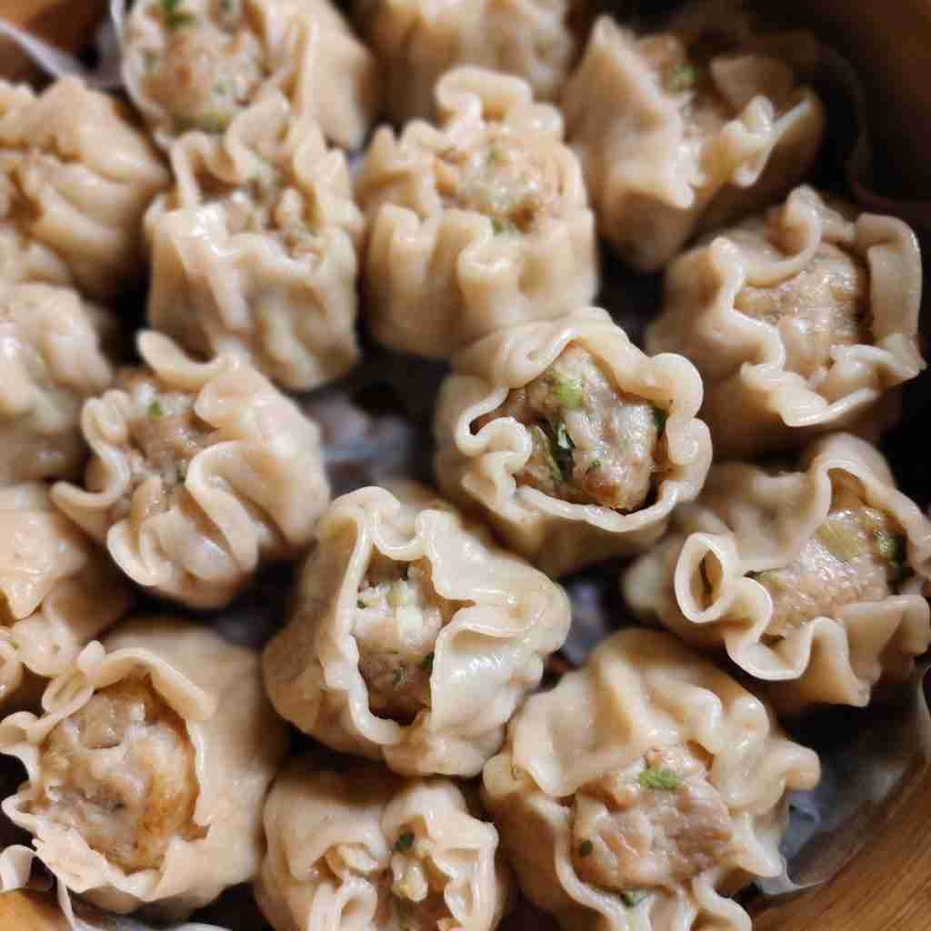 image of steamed dumplings, you can learn how to make them at cookery school Gourmandises Academie, Cambridge